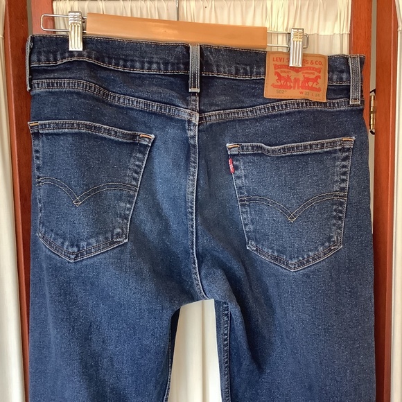 Levi’s 502 Mens Blue Denim Jeans Taper Leg Size 33x34 Stretch - Picture 5 of 7